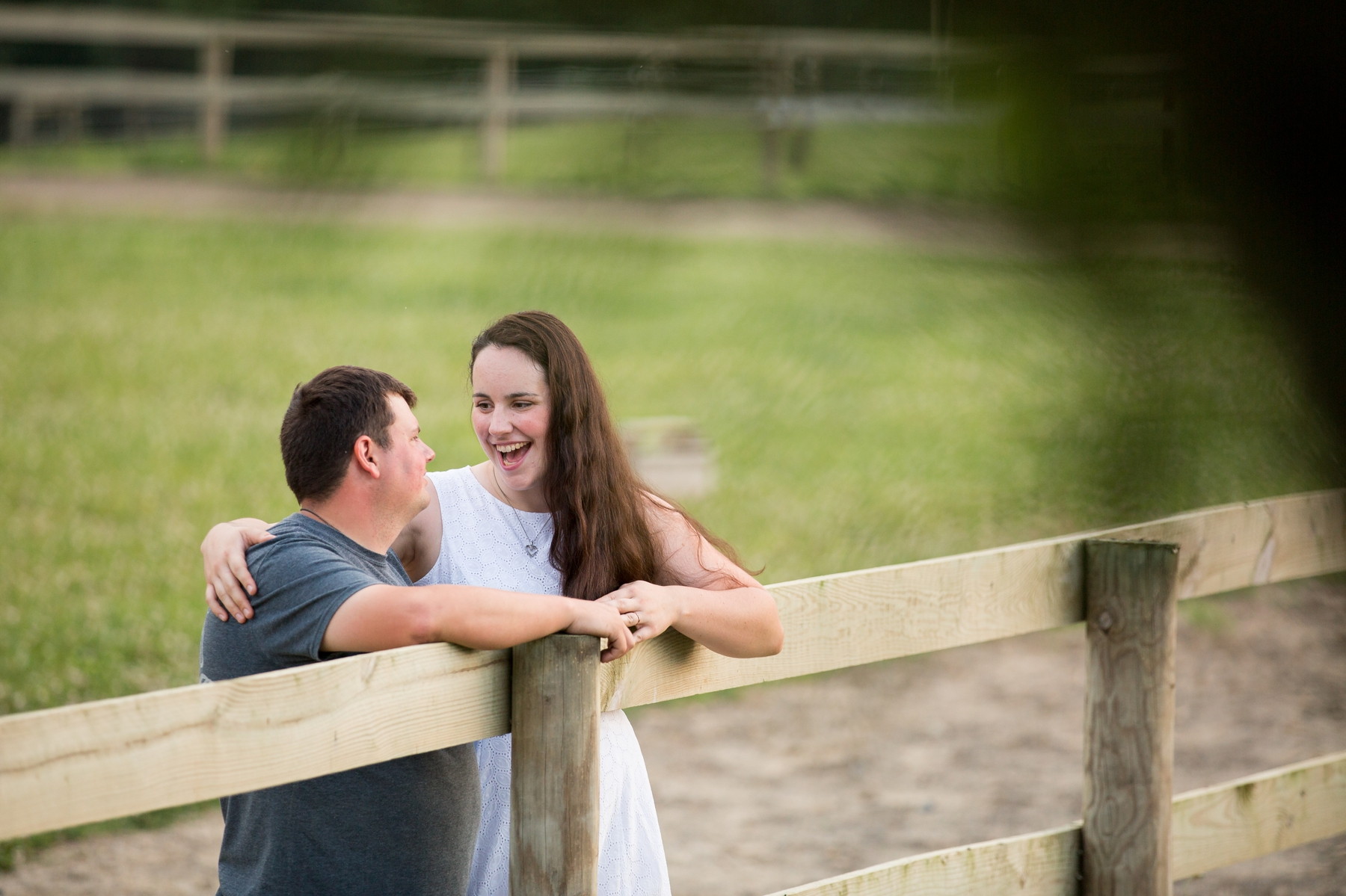 fun engagement photos at a horse farm